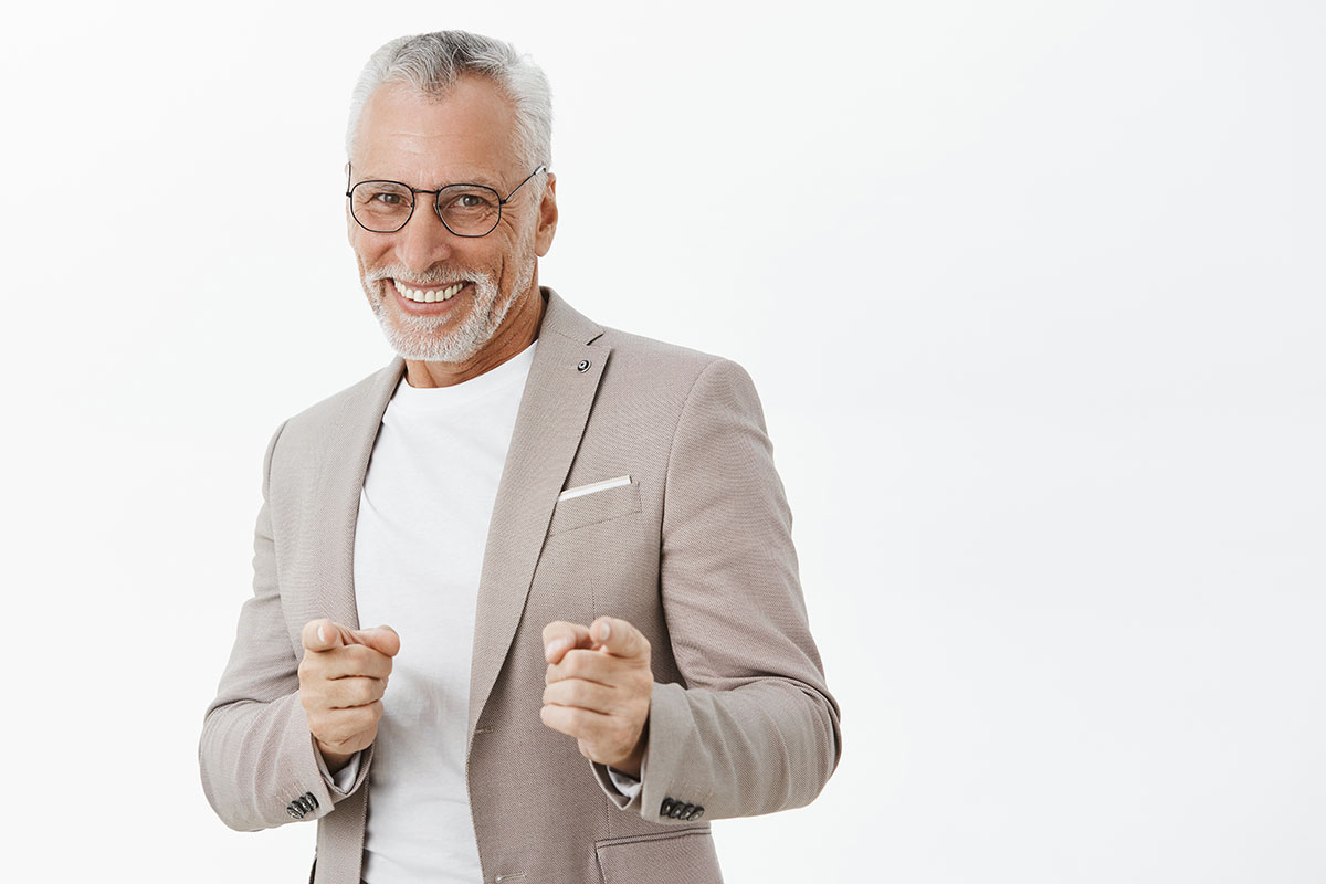 Can HGH Injections Increase Penis Size handsome successful senior man suit pointing fingers smiling sassy